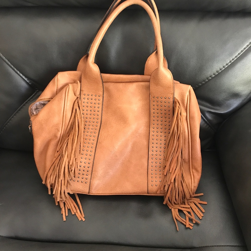 Like new fashionable handbag lots of pockets